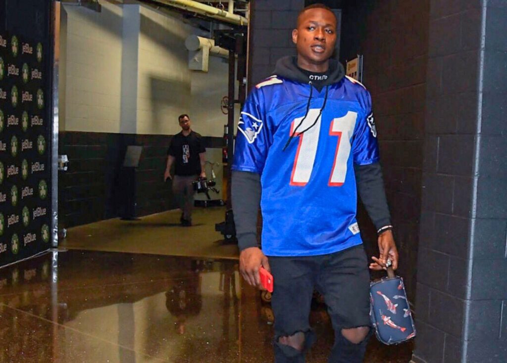 Eric Bledsoe wears Drew Bledsoe jersey.